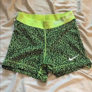 Yellow and black Nike pro shorts